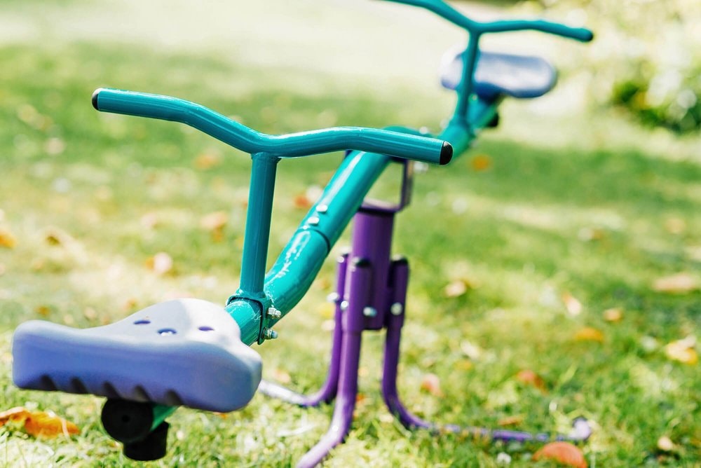 Plum Rotating Metal Kids See Saw
