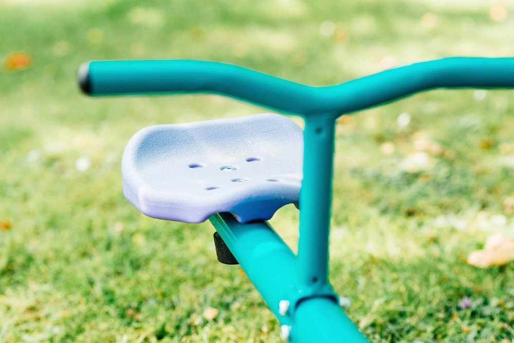 Plum Rotating Metal Kids See Saw